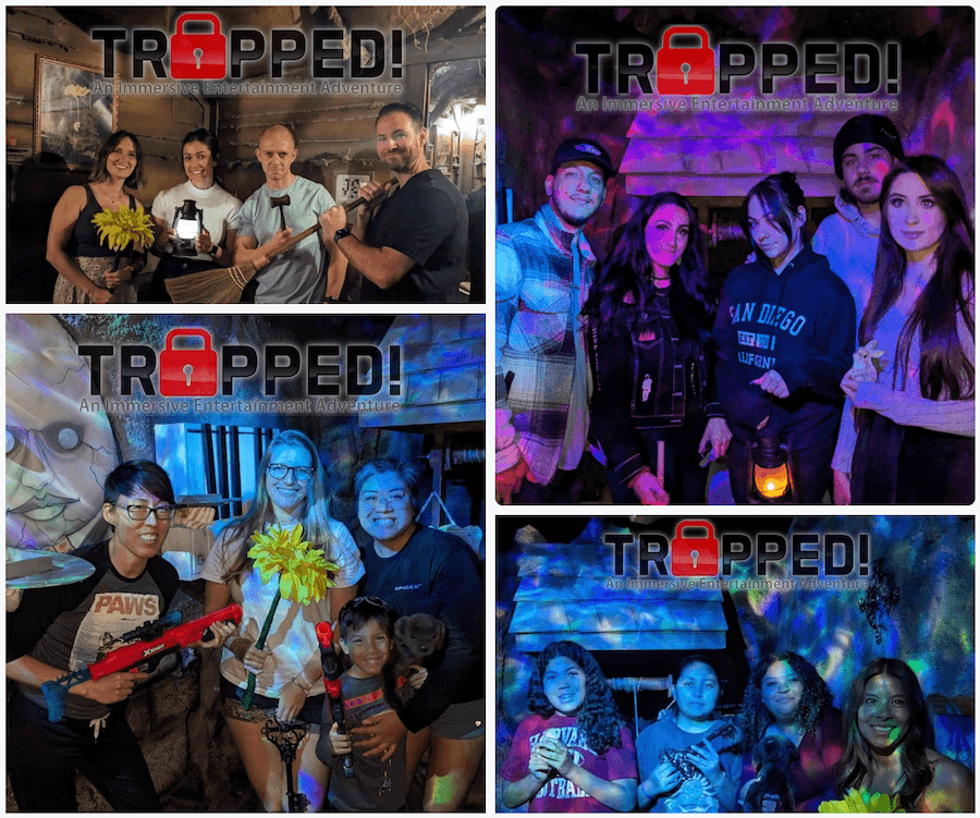Players posing for a victory photo after escaping a room at Trapped!